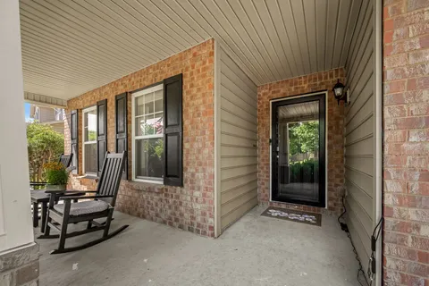 a view of porch with furniture
