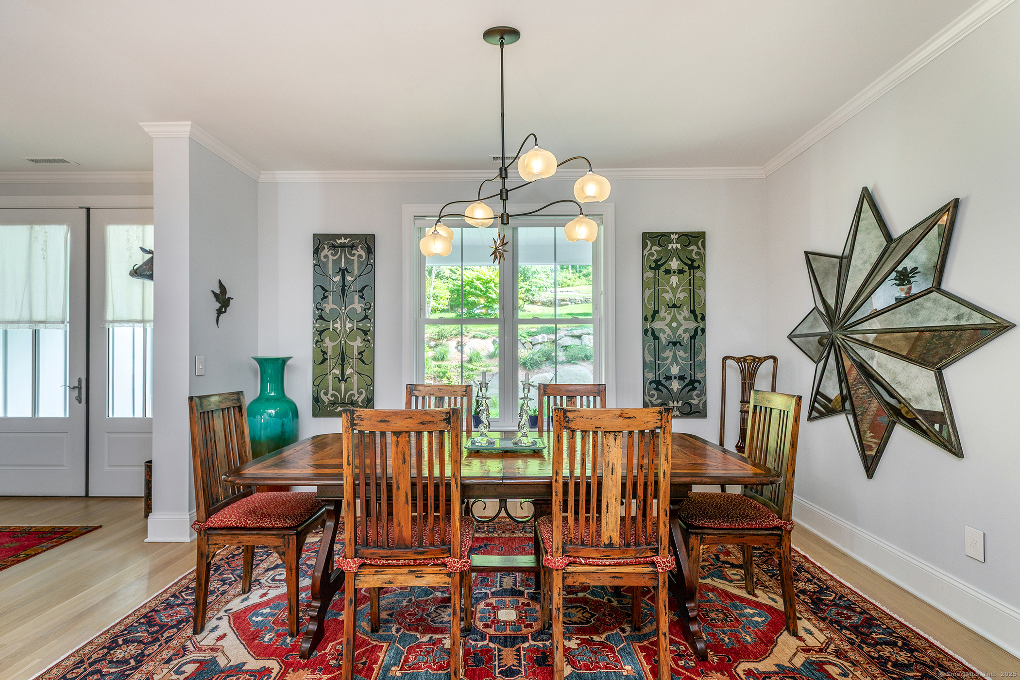 73 Long River Road Sherman, CT 06784 - Photo 16 of 31 a view of a dining room with furniture window and outside view