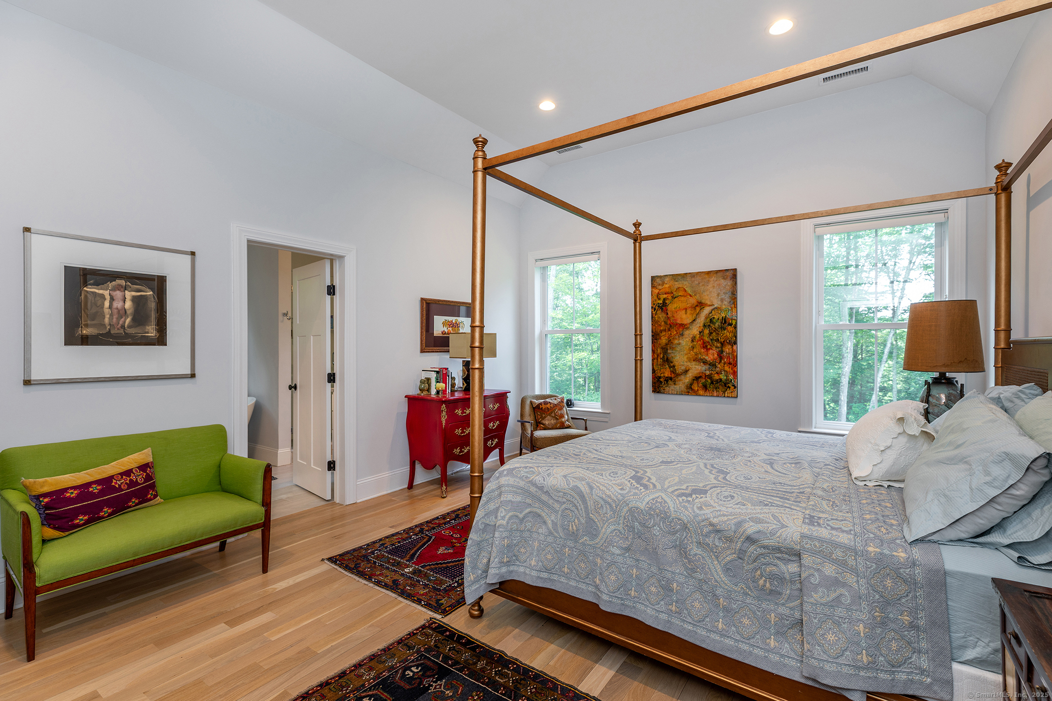 73 Long River Road Sherman, CT 06784 - Photo 19 of 31 a bed room with a bed and a couch
