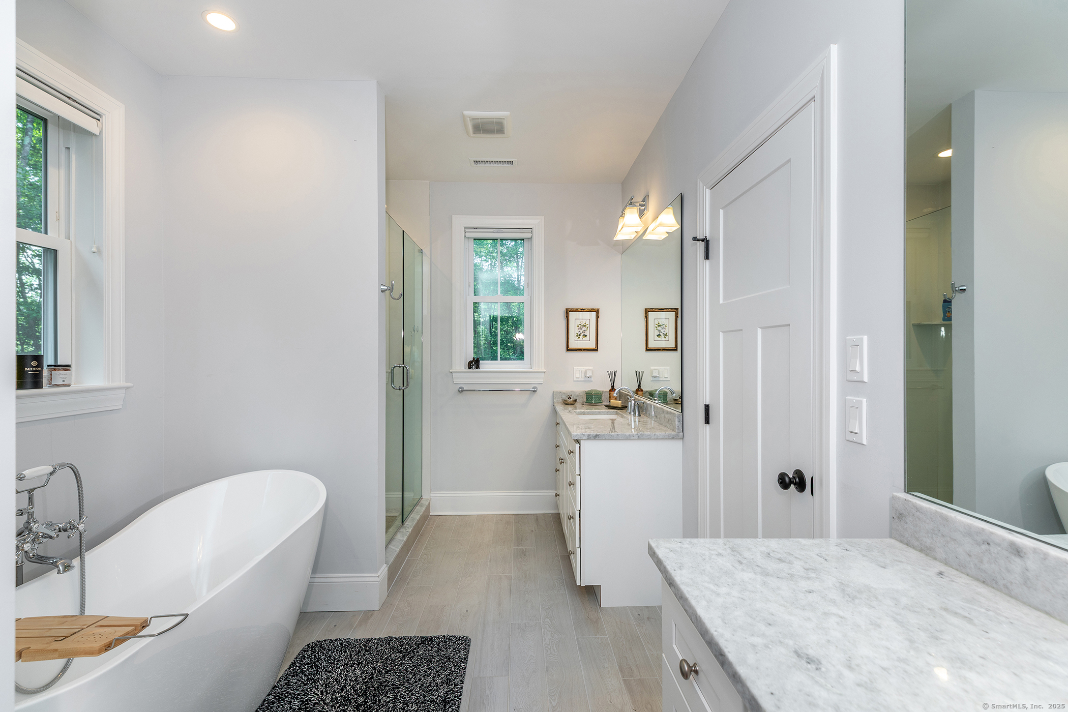 73 Long River Road Sherman, CT 06784 - Photo 21 of 31 a bathroom with a sink toilet and shower