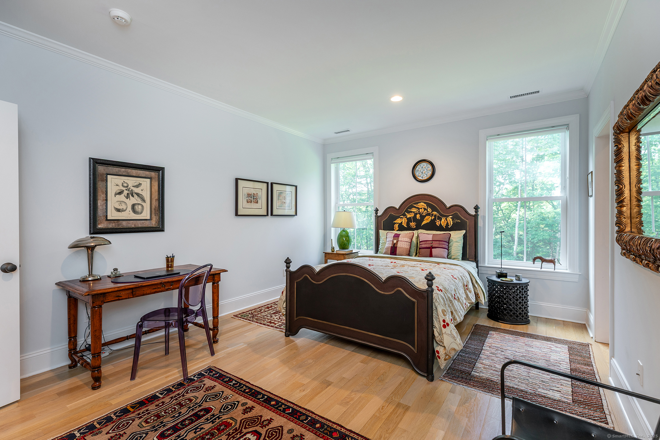 73 Long River Road Sherman, CT 06784 - Photo 22 of 31 a bedroom with a bed and a window