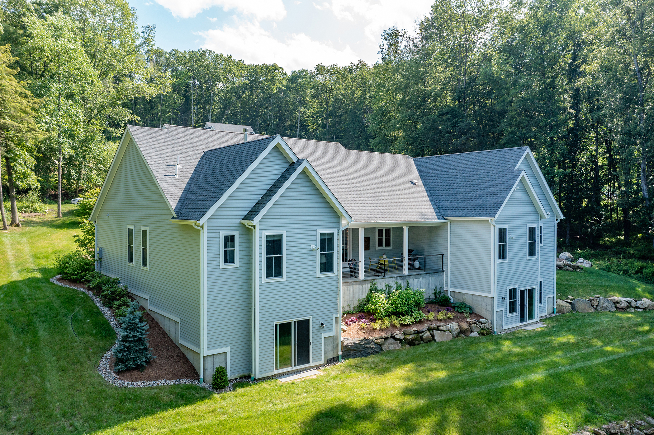 73 Long River Road Sherman, CT 06784 - Photo 27 of 31 a view of a house with backyard and garden