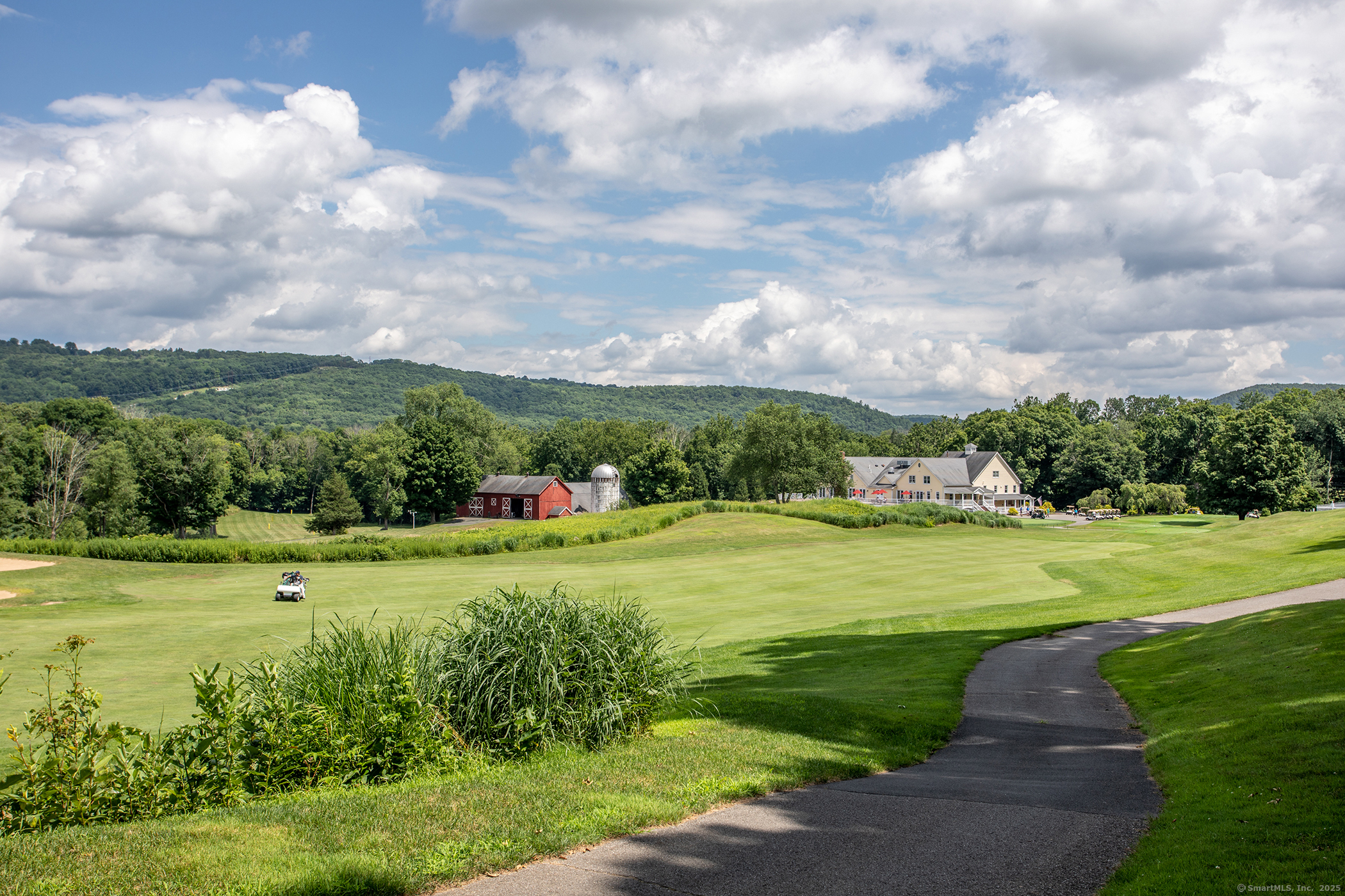 73 Long River Road Sherman, CT 06784 - Photo 30 of 31 a view of a golf course with a big yard