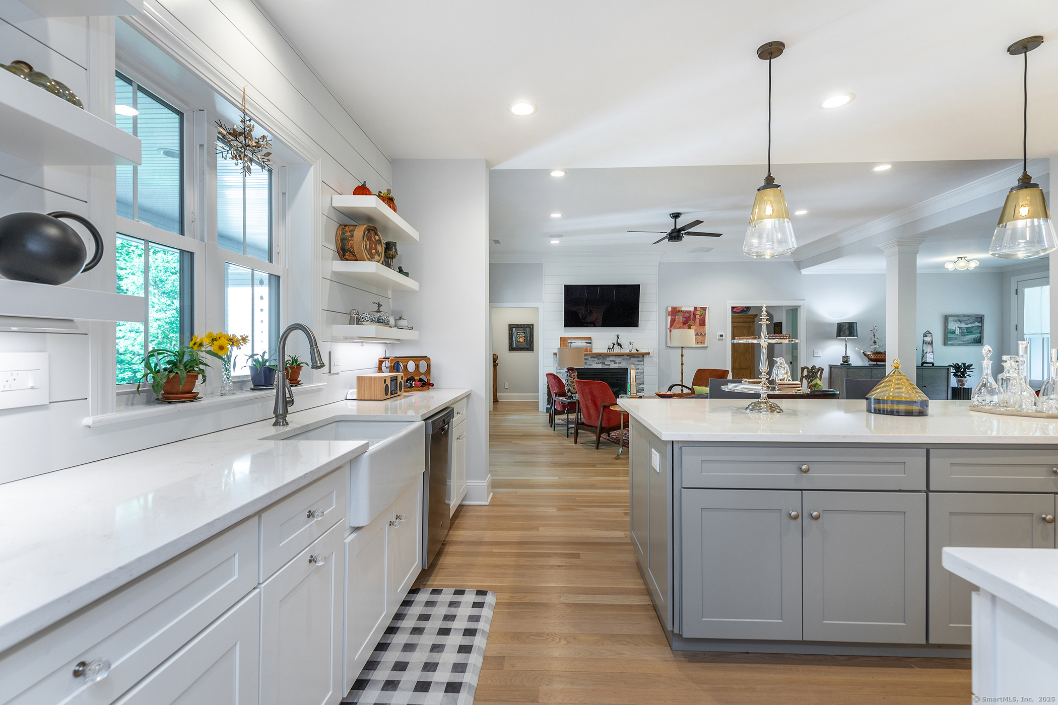 73 Long River Road Sherman, CT 06784 - Photo 9 of 31 a kitchen with a sink stainless steel appliances and cabinets
