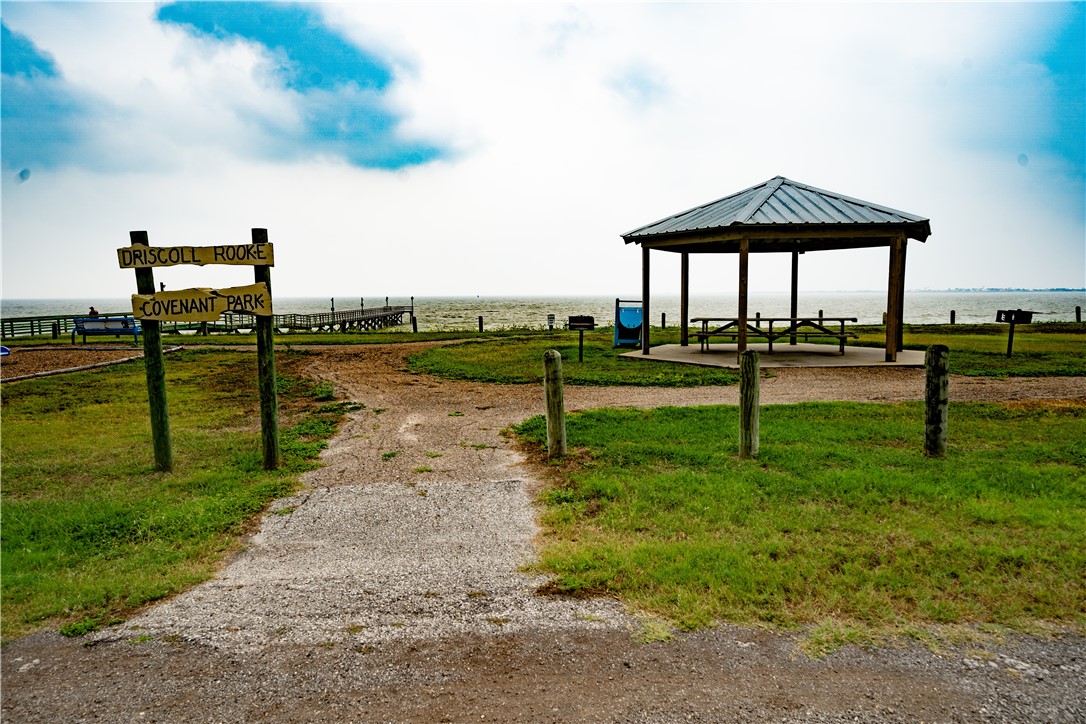 608 1st Street Bayside, TX 78340 - Photo 13 of 16 a view of a garden with a lake view