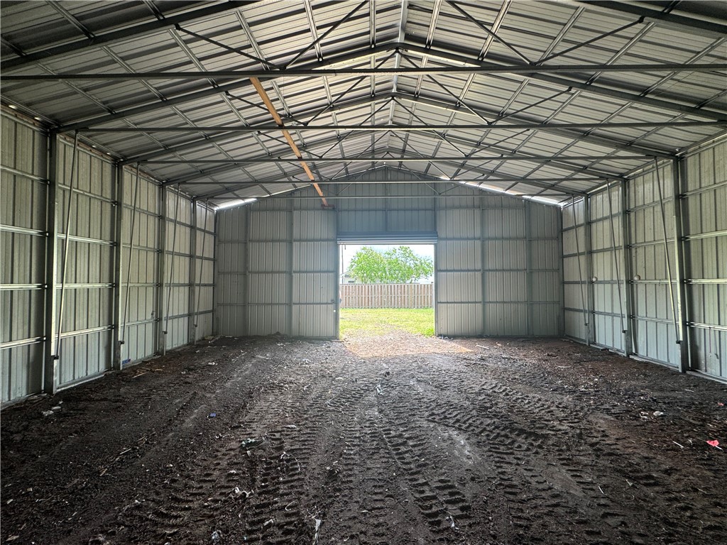 608 1st Street Bayside, TX 78340 - Photo 2 of 16 a view of a backyard of a house