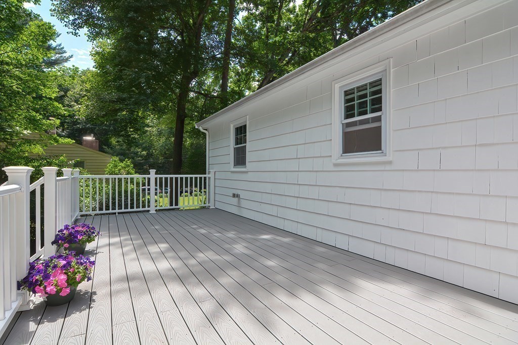 2 Labo Lane Bedford, MA 01730 - Photo 14 of 40 a balcony with wooden floor