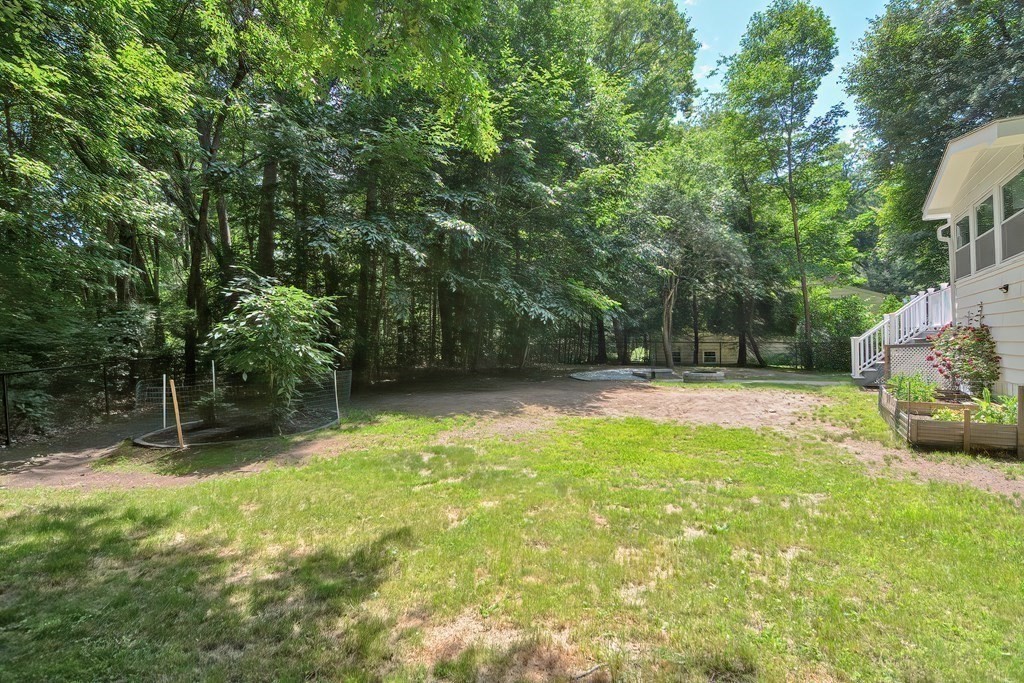 2 Labo Lane Bedford, MA 01730 - Photo 40 of 40 a view of swimming pool with a backyard
