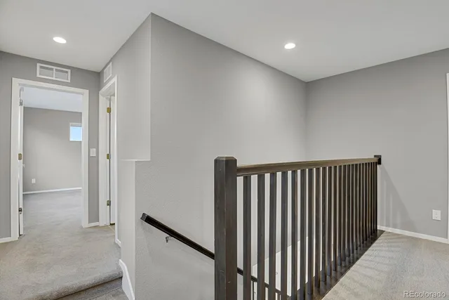 a view of a hallway with entryway