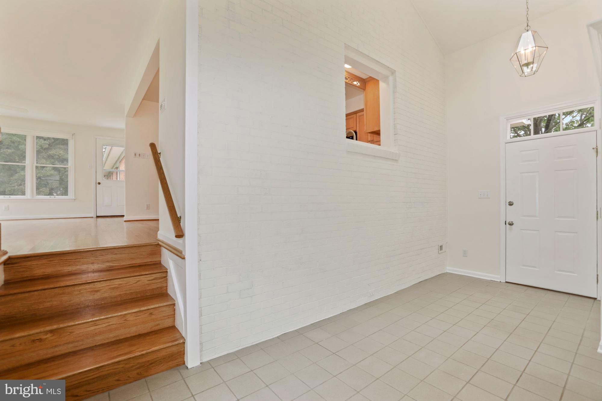 11502 Fox Hill Road Culpeper, VA 22701 - Photo 20 of 49 Secondary entrance w/ skylights & vaulted ceiling