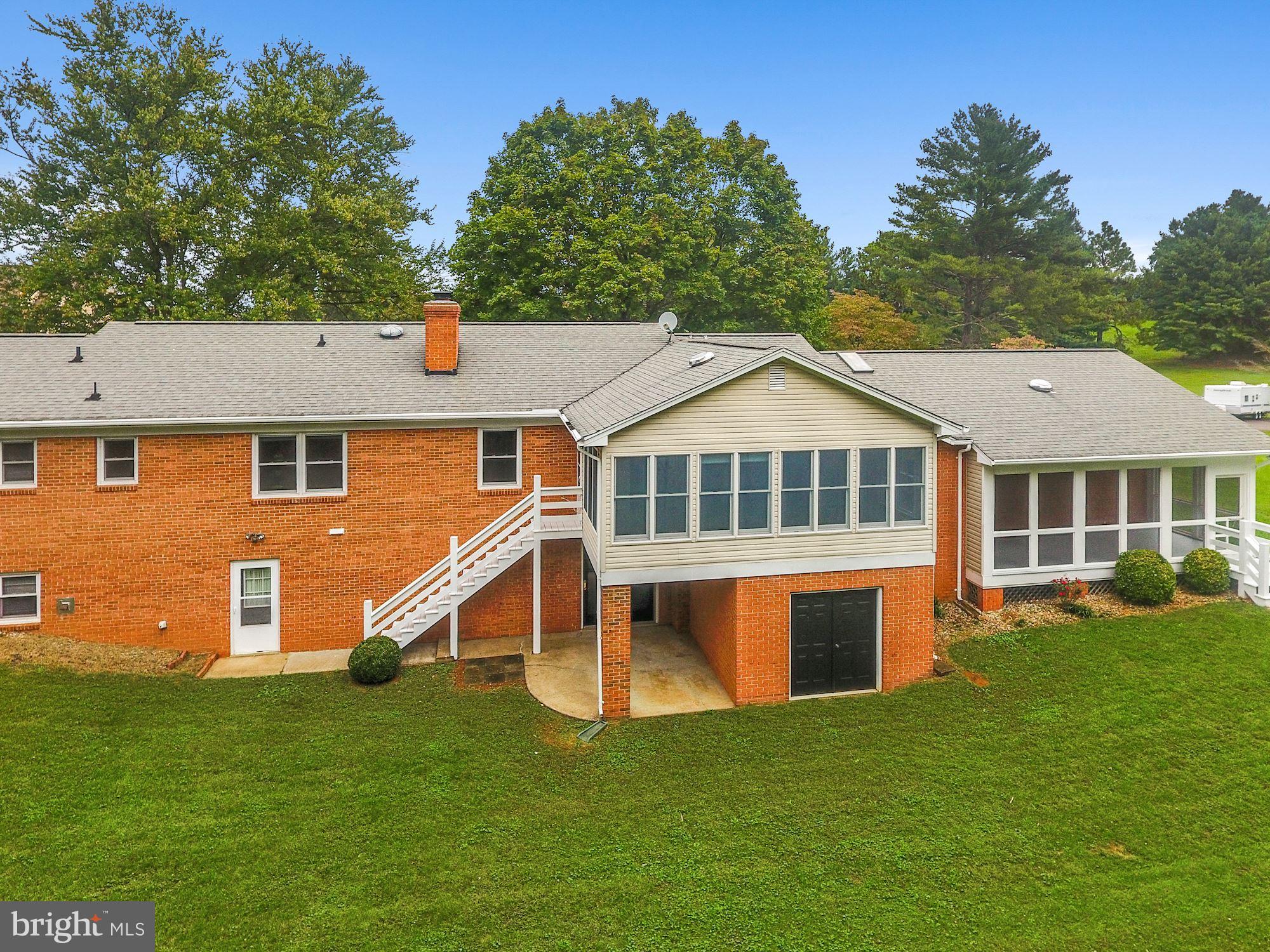 11502 Fox Hill Road Culpeper, VA 22701 - Photo 38 of 49 View of sunroom & storage below w/ outside access