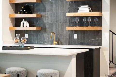 a closeup of a sink with a cabinet