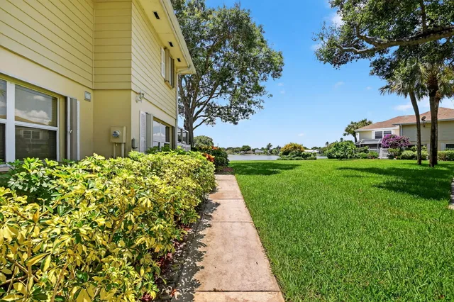 a view of a pathway with a house