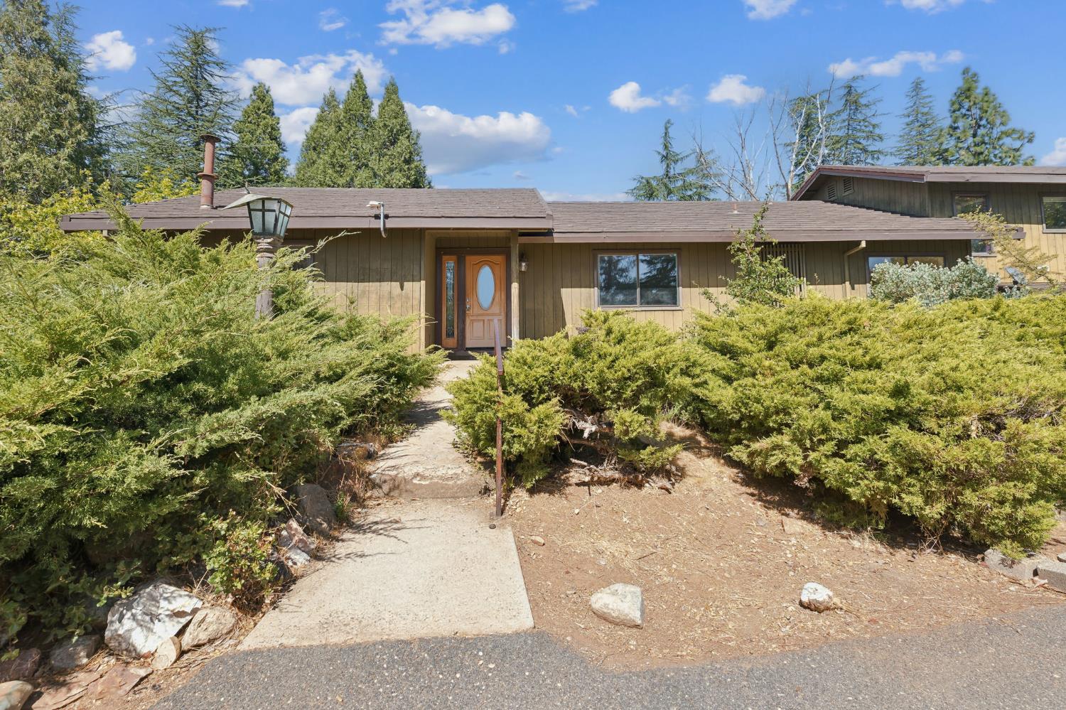 a view of a lake with a house in the background