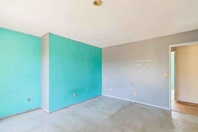 an empty room with closet