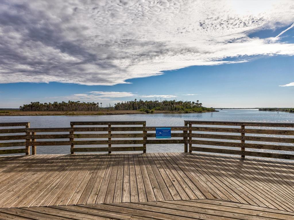 11981 Robina Road Weeki Wachee, FL 34614 - Photo 86 of 93 a view of a terrace with outdoor seating and city view