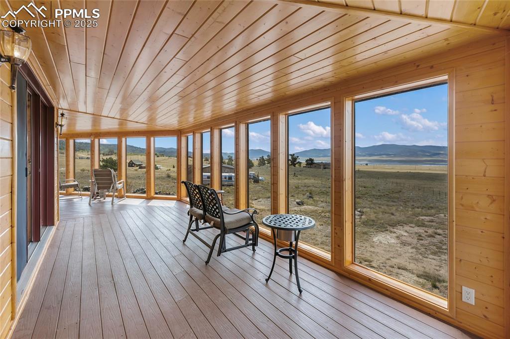 790 Tiara Road Lake George, CO 80827 - Photo 11 of 47 The sun in the summer floods this enclosed porch with warmth to help heat the house