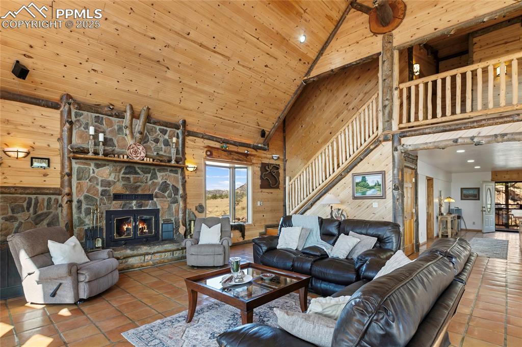 790 Tiara Road Lake George, CO 80827 - Photo 12 of 47 a living room with furniture or fireplace and a wooden floor