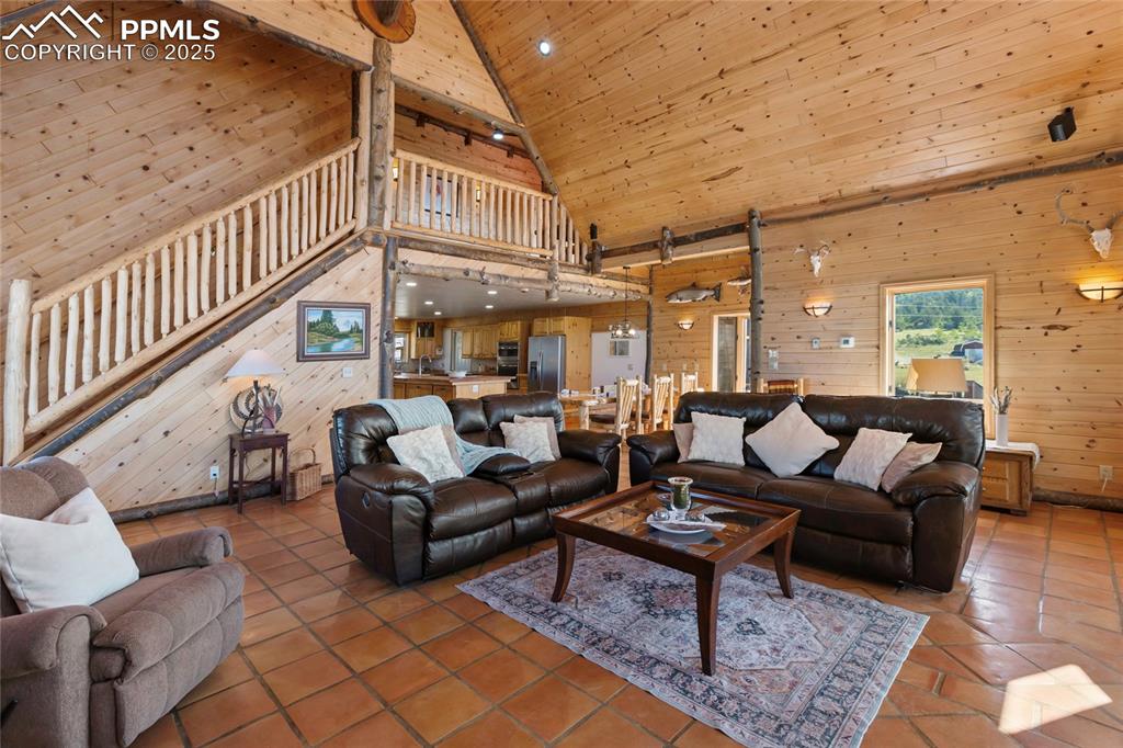 790 Tiara Road Lake George, CO 80827 - Photo 13 of 47 a living room with furniture and a table