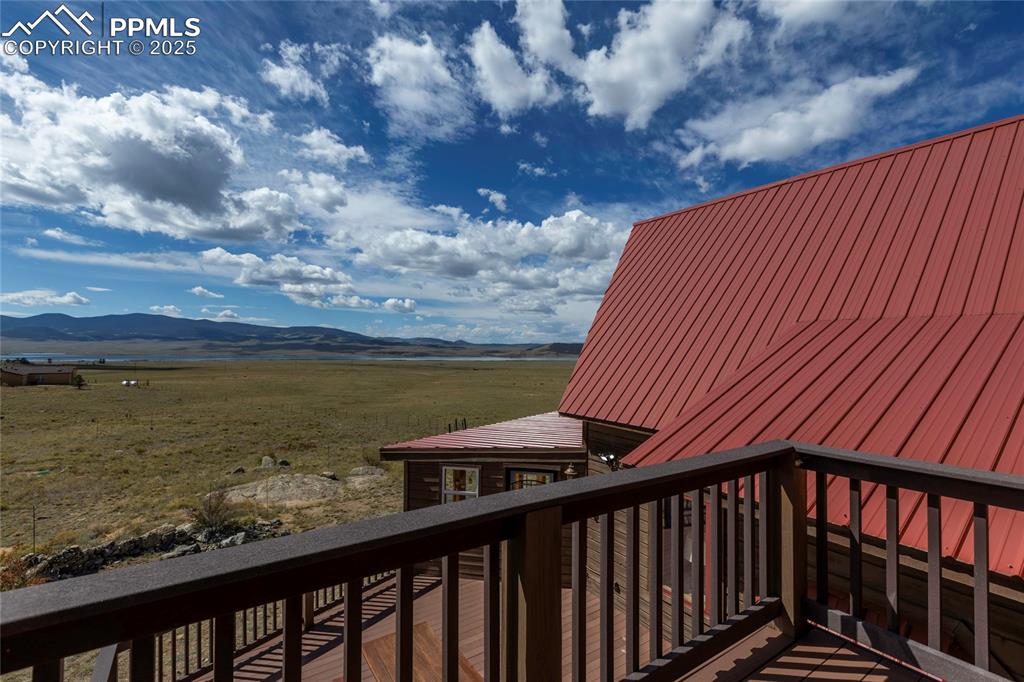 790 Tiara Road Lake George, CO 80827 - Photo 18 of 47 a balcony with an outdoor space