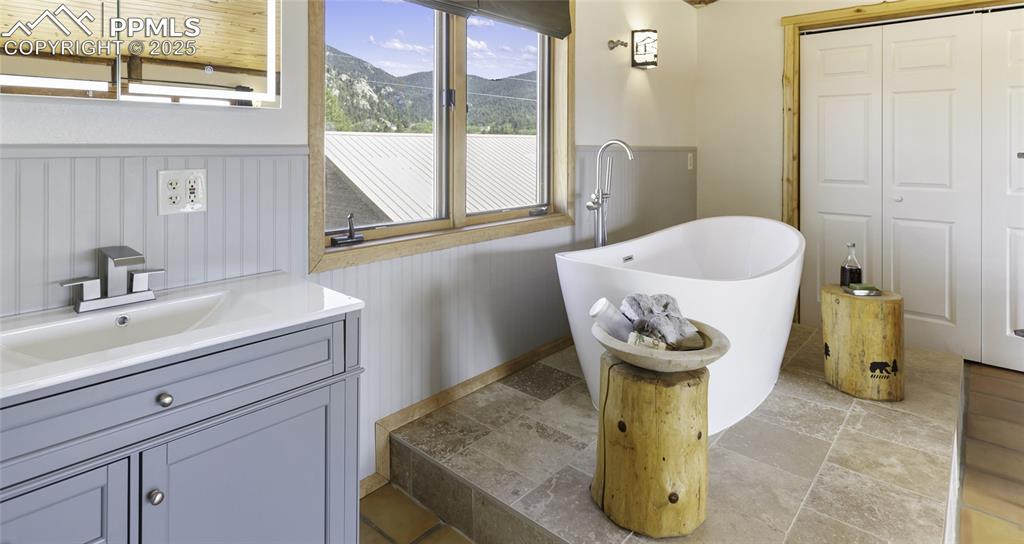 790 Tiara Road Lake George, CO 80827 - Photo 20 of 47 a bathroom with a sink and mirror