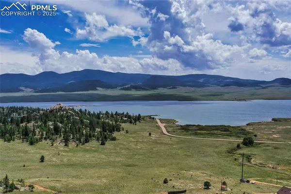 a view of lake with mountain