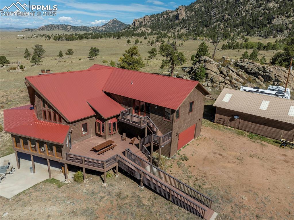 790 Tiara Road Lake George, CO 80827 - Photo 37 of 47 an aerial view of a house with a yard
