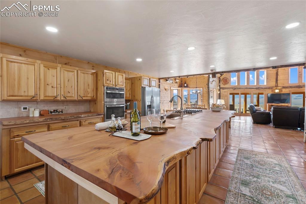 790 Tiara Road Lake George, CO 80827 - Photo 4 of 47 Expansive live-edge kitchen island