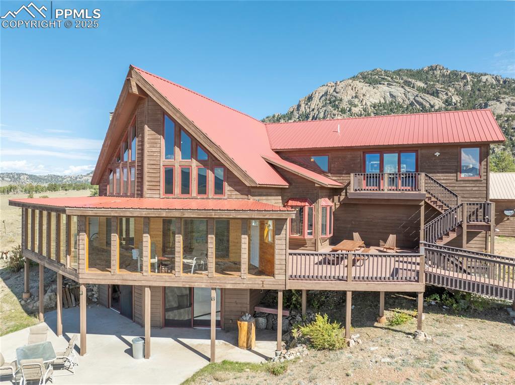 790 Tiara Road Lake George, CO 80827 - Photo 47 of 47 a front view of a house with a porch
