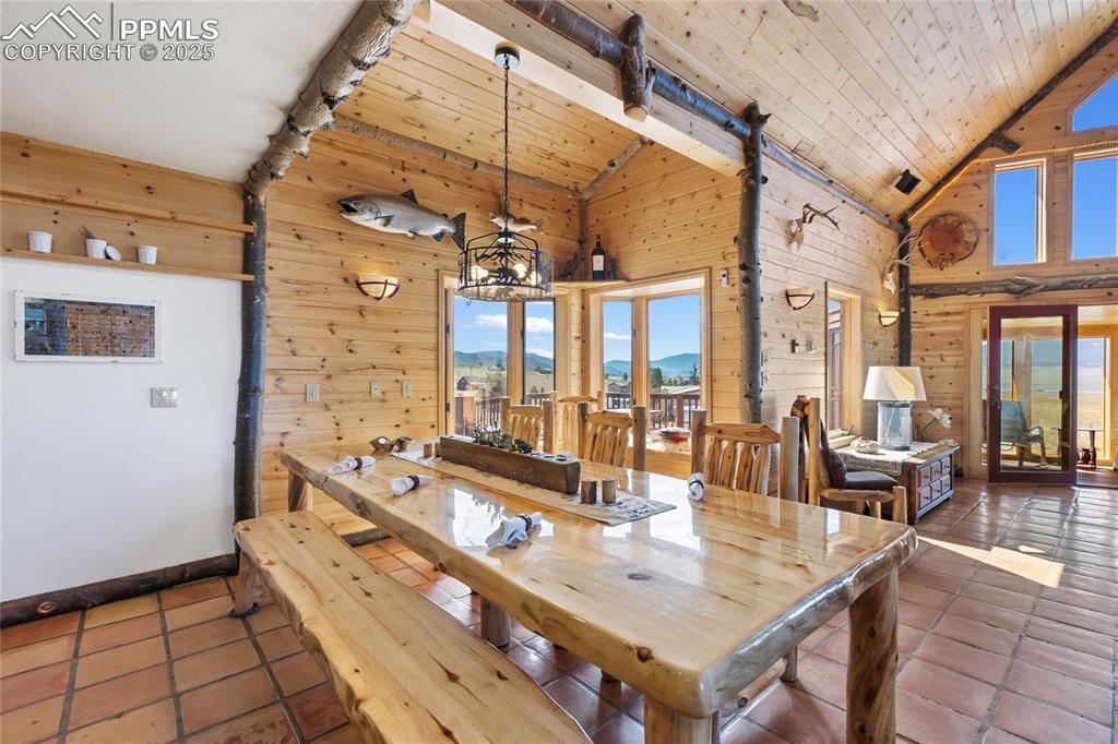 790 Tiara Road Lake George, CO 80827 - Photo 9 of 47 a large kitchen with a table and chairs