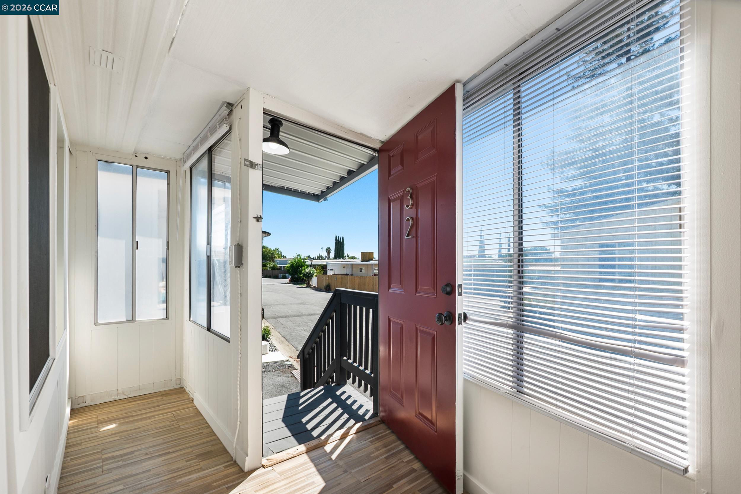 32 Galloway Drive Concord, CA 94518 - Photo 4 of 35 a view of a balcony with wooden floor and staircase