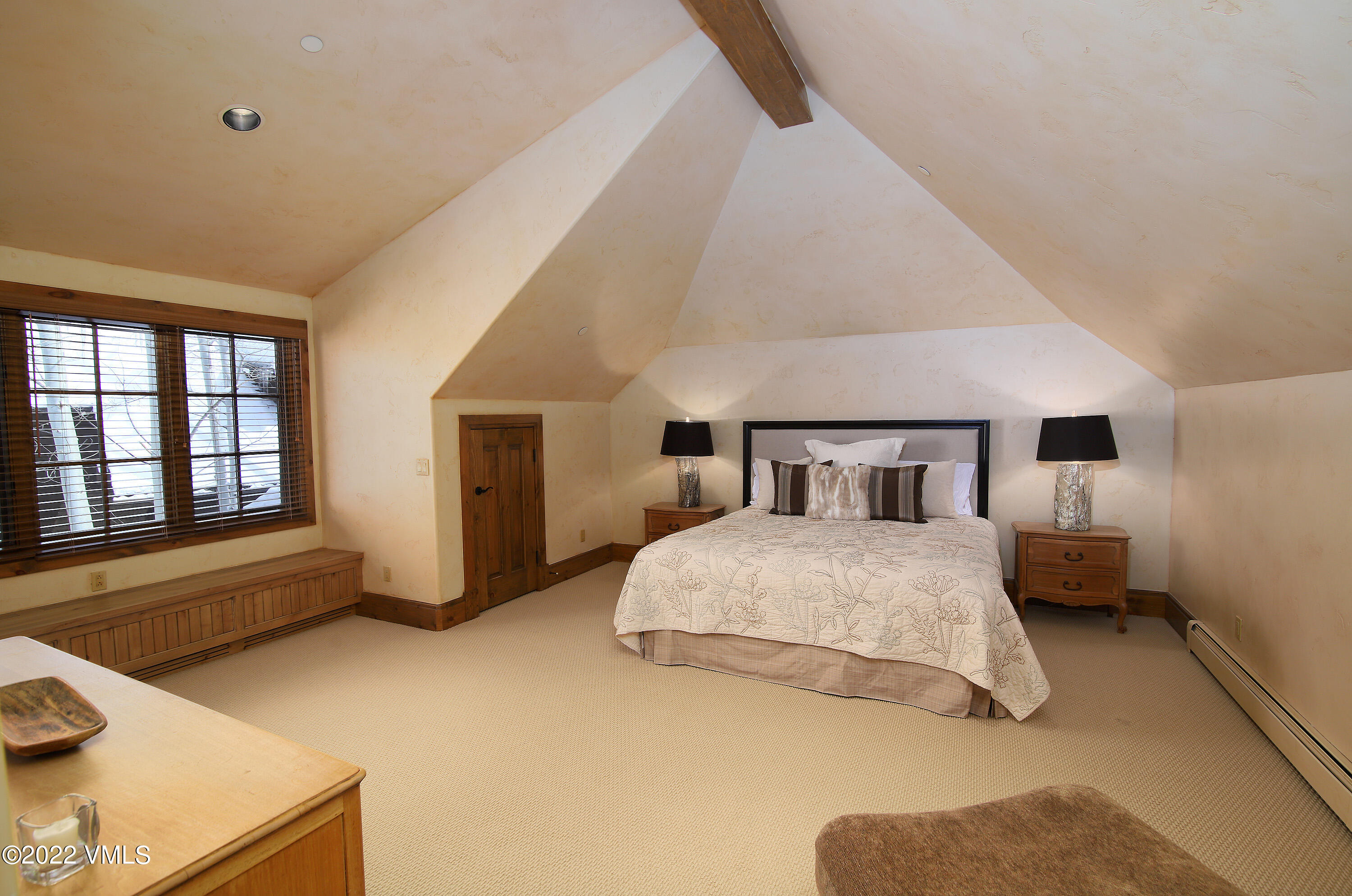 31 Trailside Lane Edwards, CO 81632 - Photo 15 of 30 a spacious bedroom with a bed and window