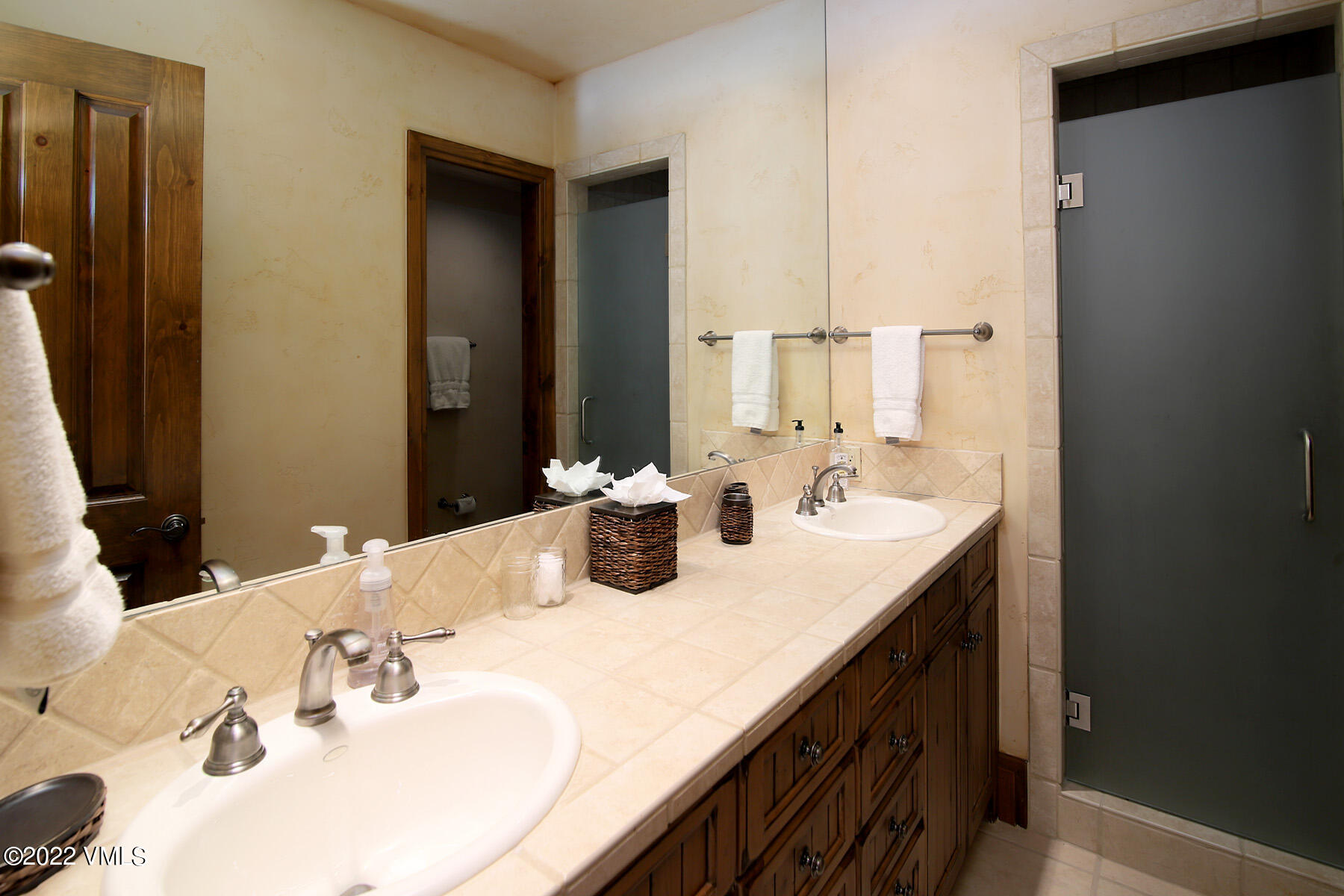 31 Trailside Lane Edwards, CO 81632 - Photo 18 of 30 a bathroom with double vanity sinks and a mirror