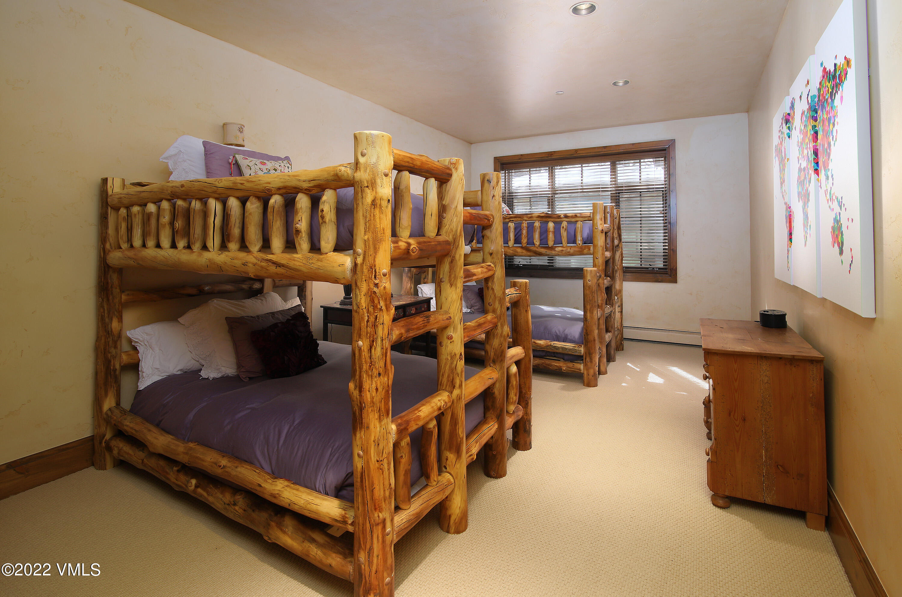 31 Trailside Lane Edwards, CO 81632 - Photo 20 of 30 a bedroom with furniture and a large window