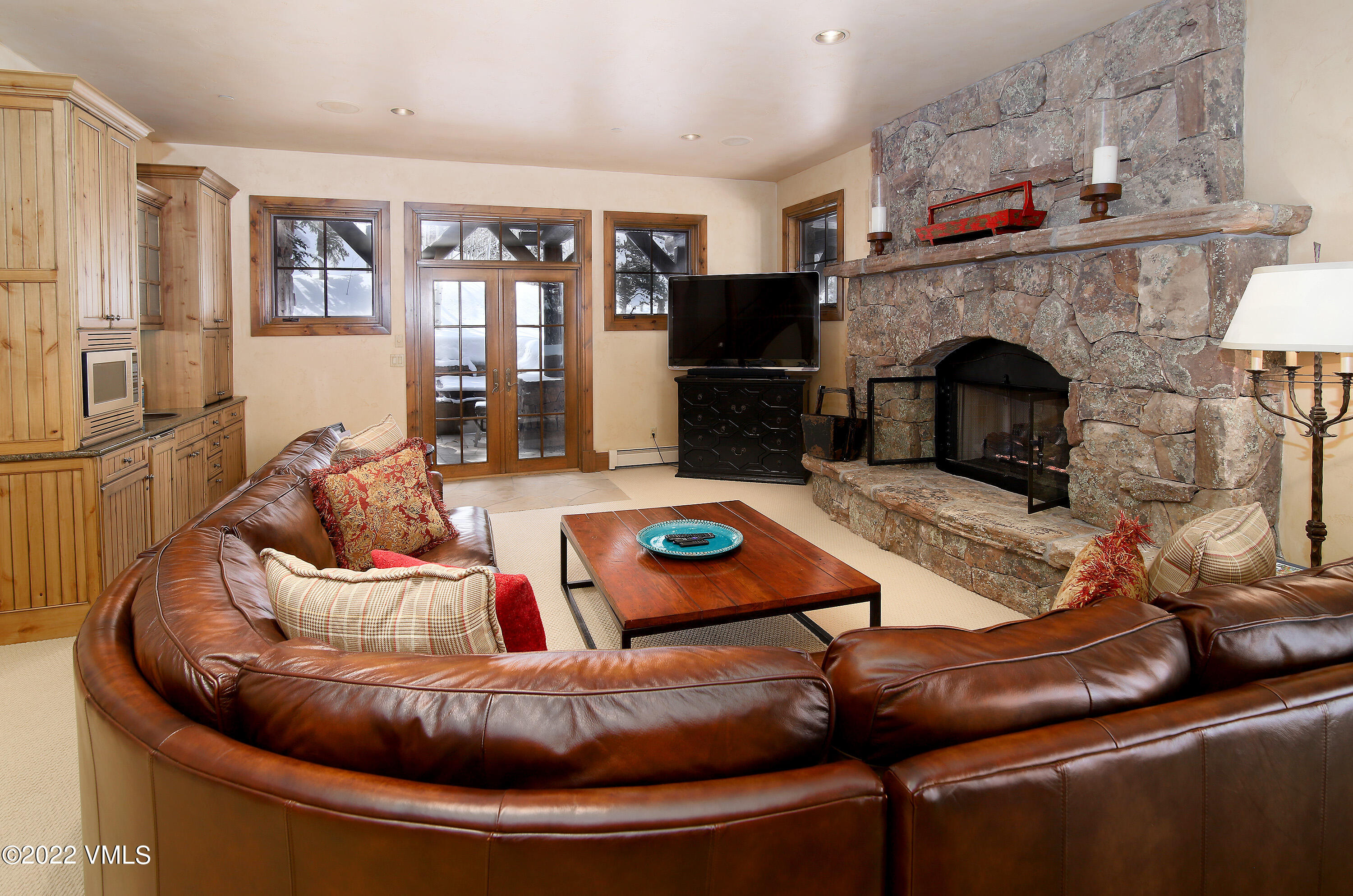 31 Trailside Lane Edwards, CO 81632 - Photo 21 of 30 a living room with furniture and a fireplace