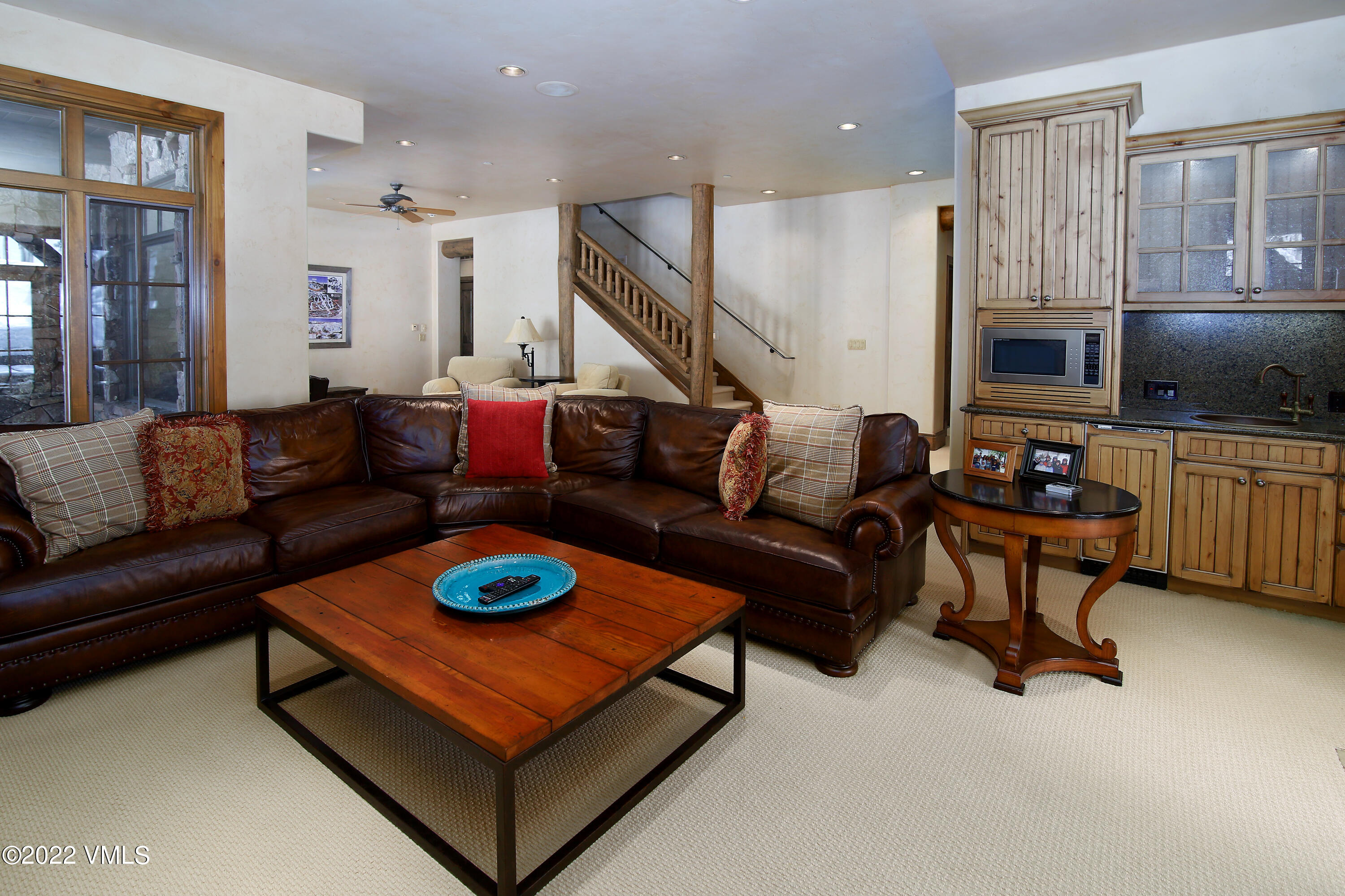 31 Trailside Lane Edwards, CO 81632 - Photo 22 of 30 a living room with furniture and a flat screen tv