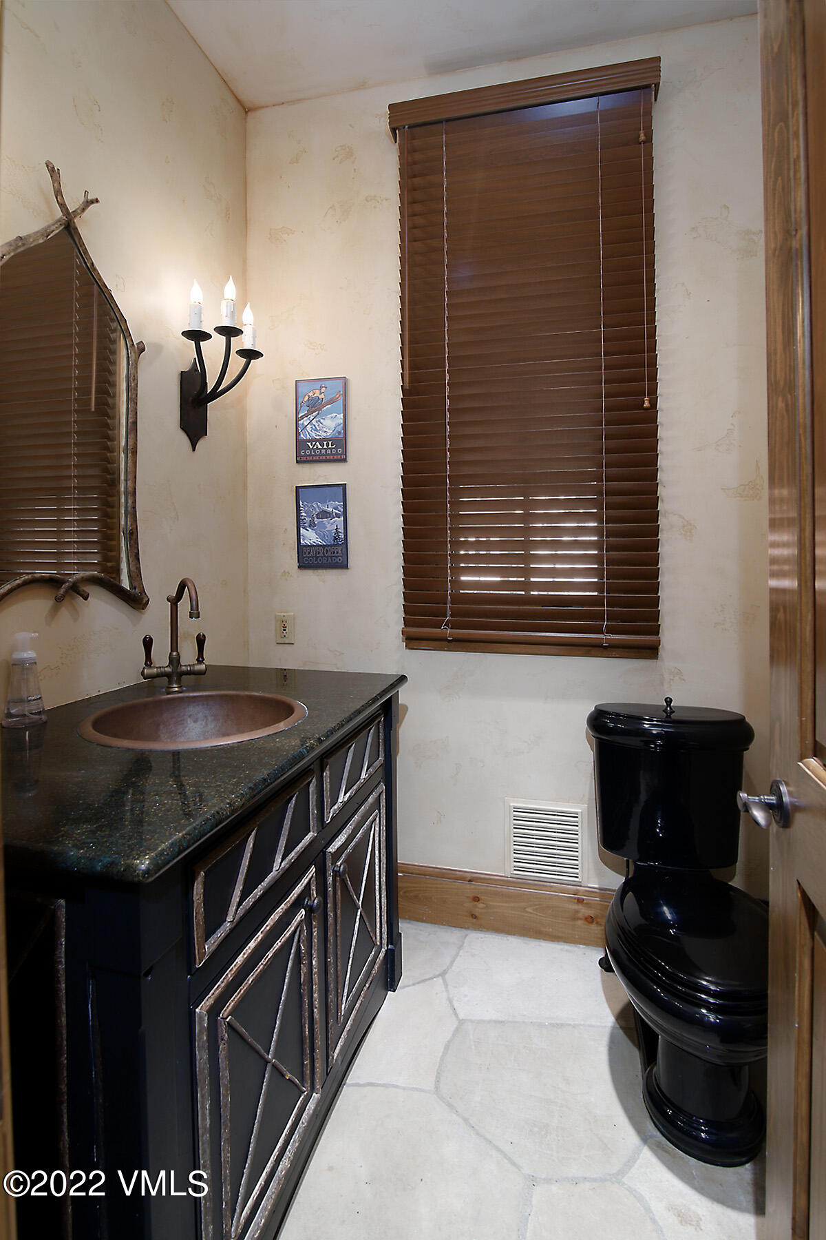 31 Trailside Lane Edwards, CO 81632 - Photo 27 of 30 a bathroom with a granite countertop sink and a mirror