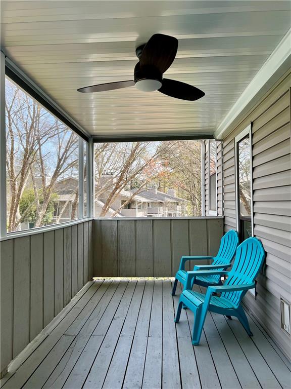 308 Wynnes Ridge Circle Southeast Marietta, GA 30067 - Photo 15 of 17 a balcony with wooden floor table and chairs