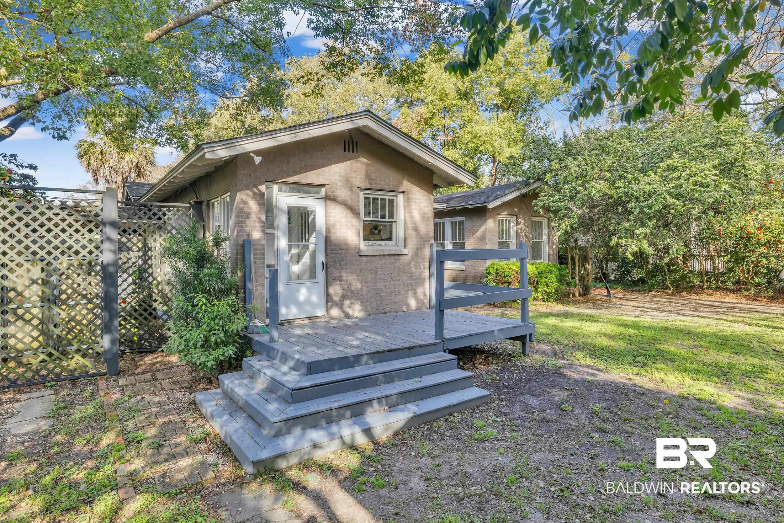 55 Mohawk Street Mobile, AL 36606 - Photo 14 of 28 Rear view of house with a deck