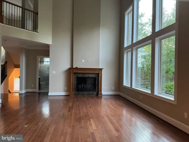 a stove top oven sitting inside of a kitchen