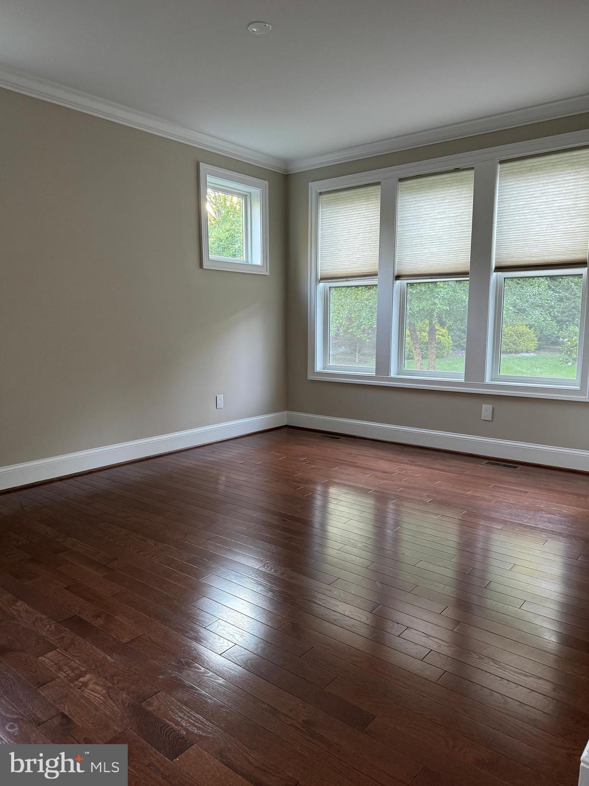 7702 Trammell Road Annandale, VA 22003 - Photo 31 of 68 a view of empty room with wooden floor and fan