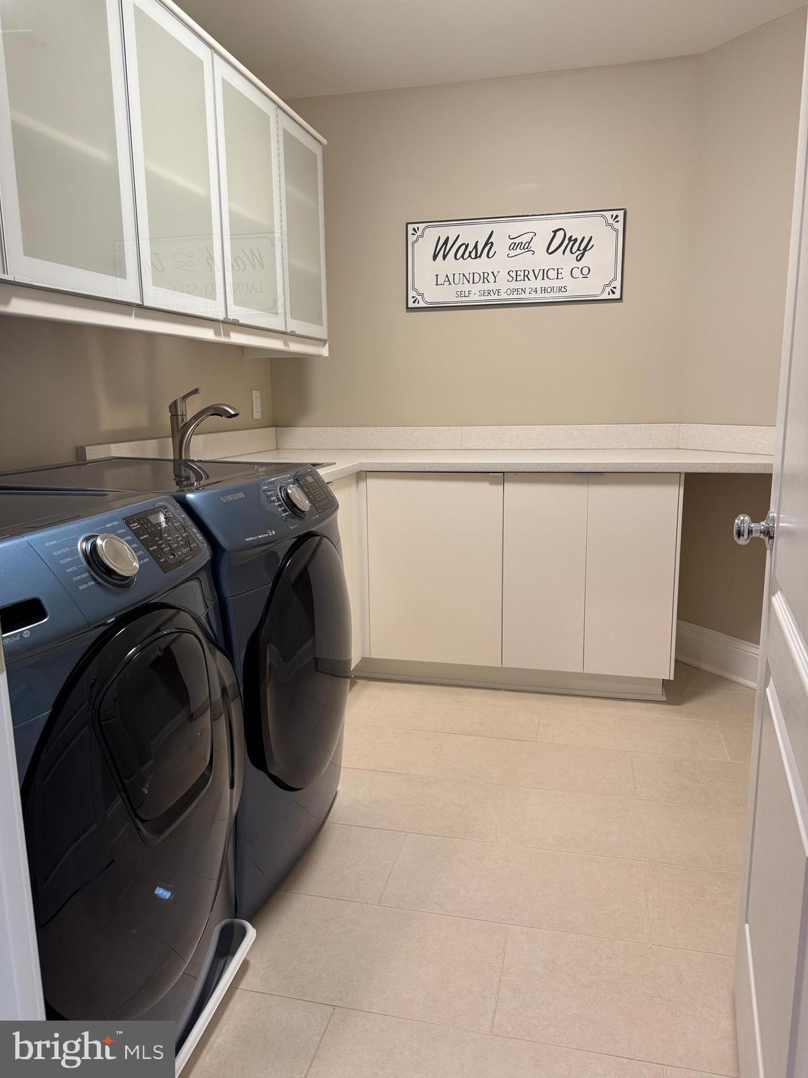 7702 Trammell Road Annandale, VA 22003 - Photo 46 of 68 a utility room with dryer and washer