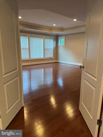 a bathroom with a sink toilet a mirror and shower
