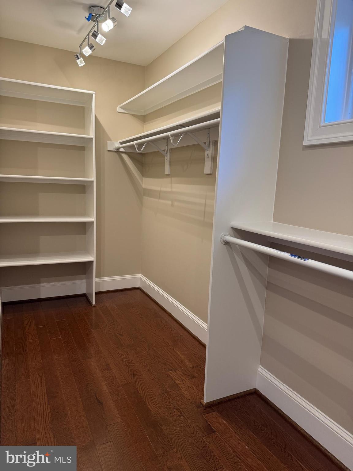 7702 Trammell Road Annandale, VA 22003 - Photo 56 of 68 a view of an empty room with wooden floor and a window