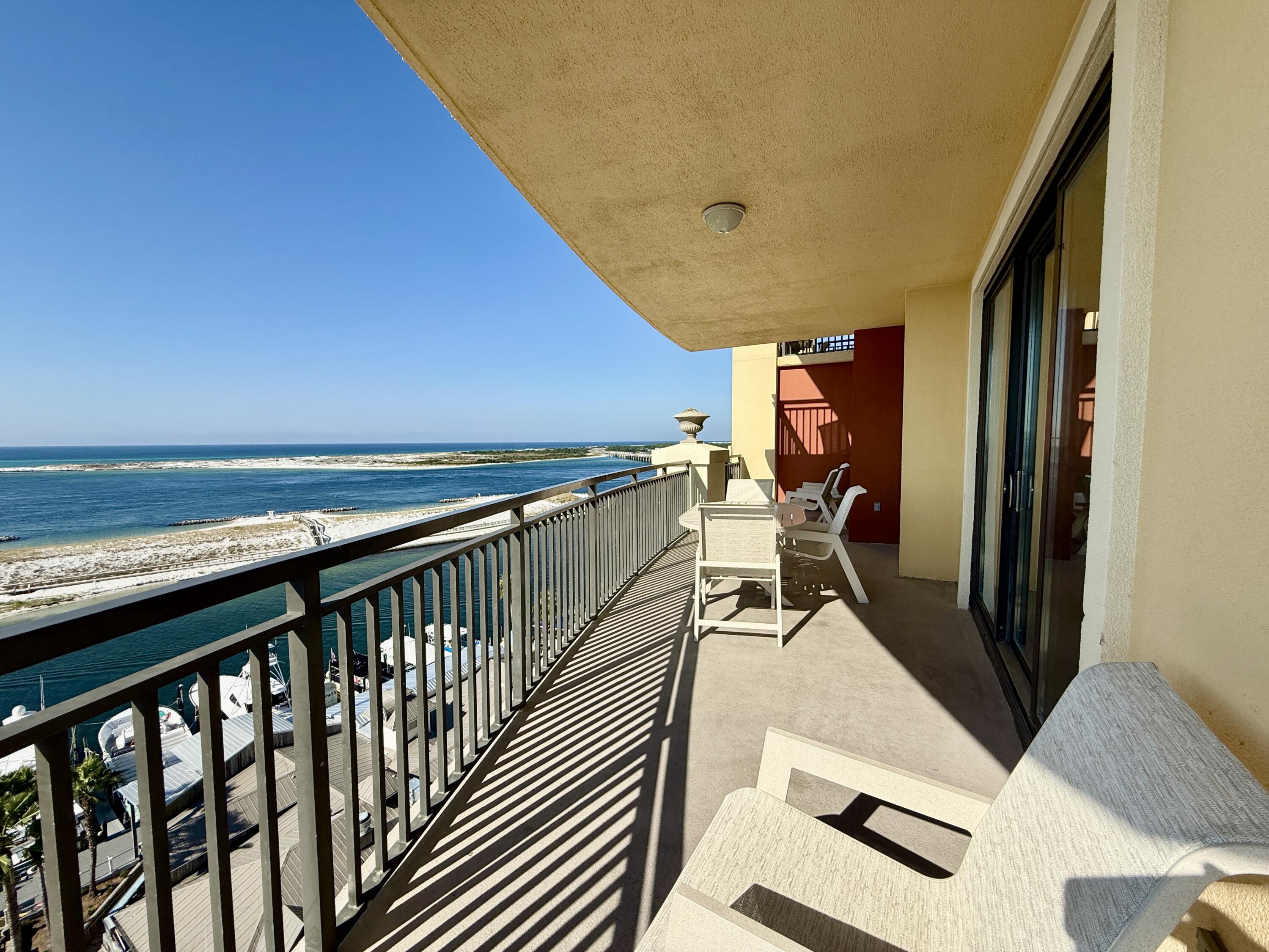 10 Harbor Boulevard, Unit E506E Destin, FL 32541 - Photo 5 of 29 a view of balcony with couch and wooden floor