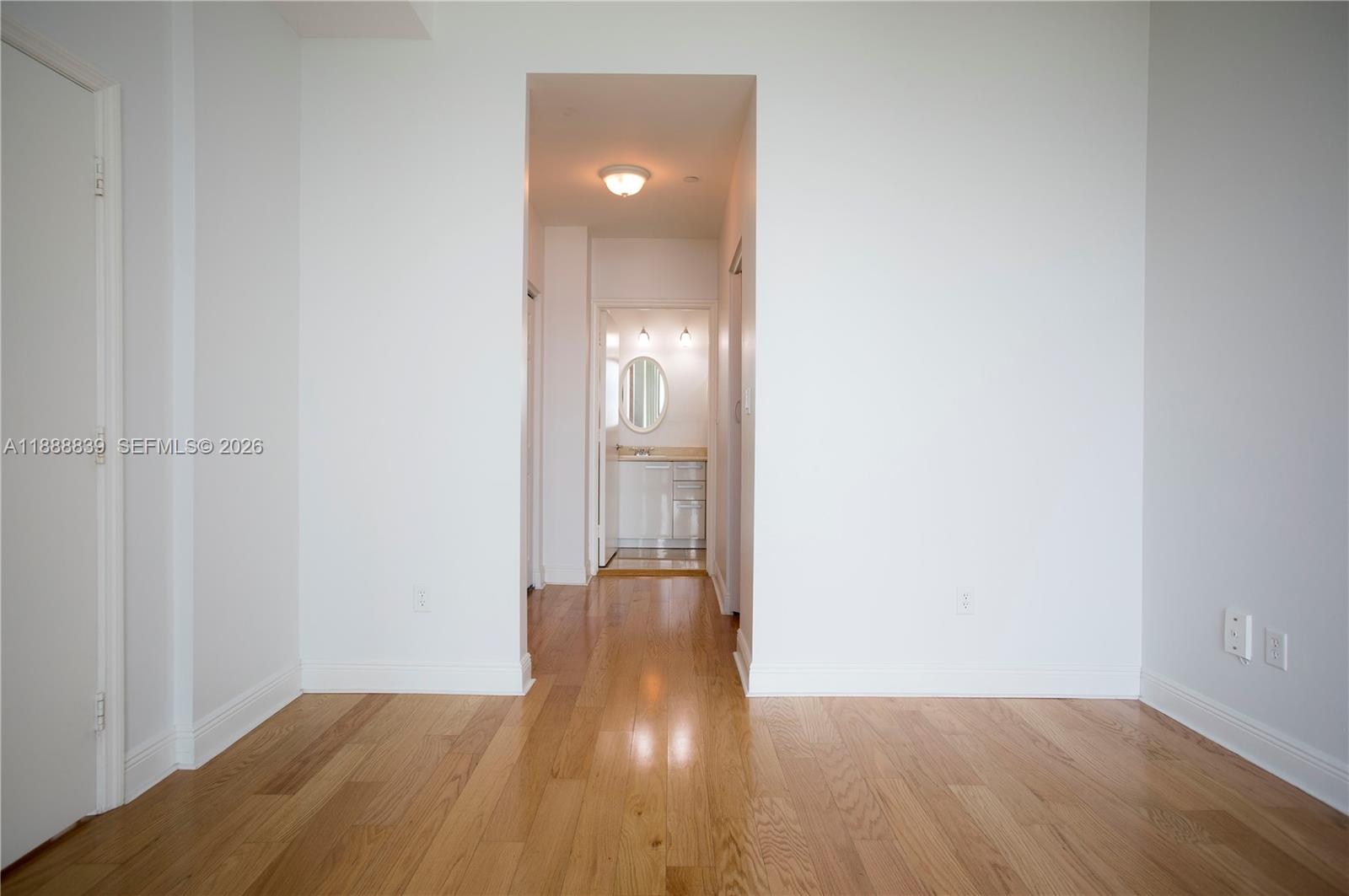 2525 Southwest 3rd Avenue, Unit 1106 Miami, FL 33129 - Photo 14 of 36 a view of a hallway with wooden floor