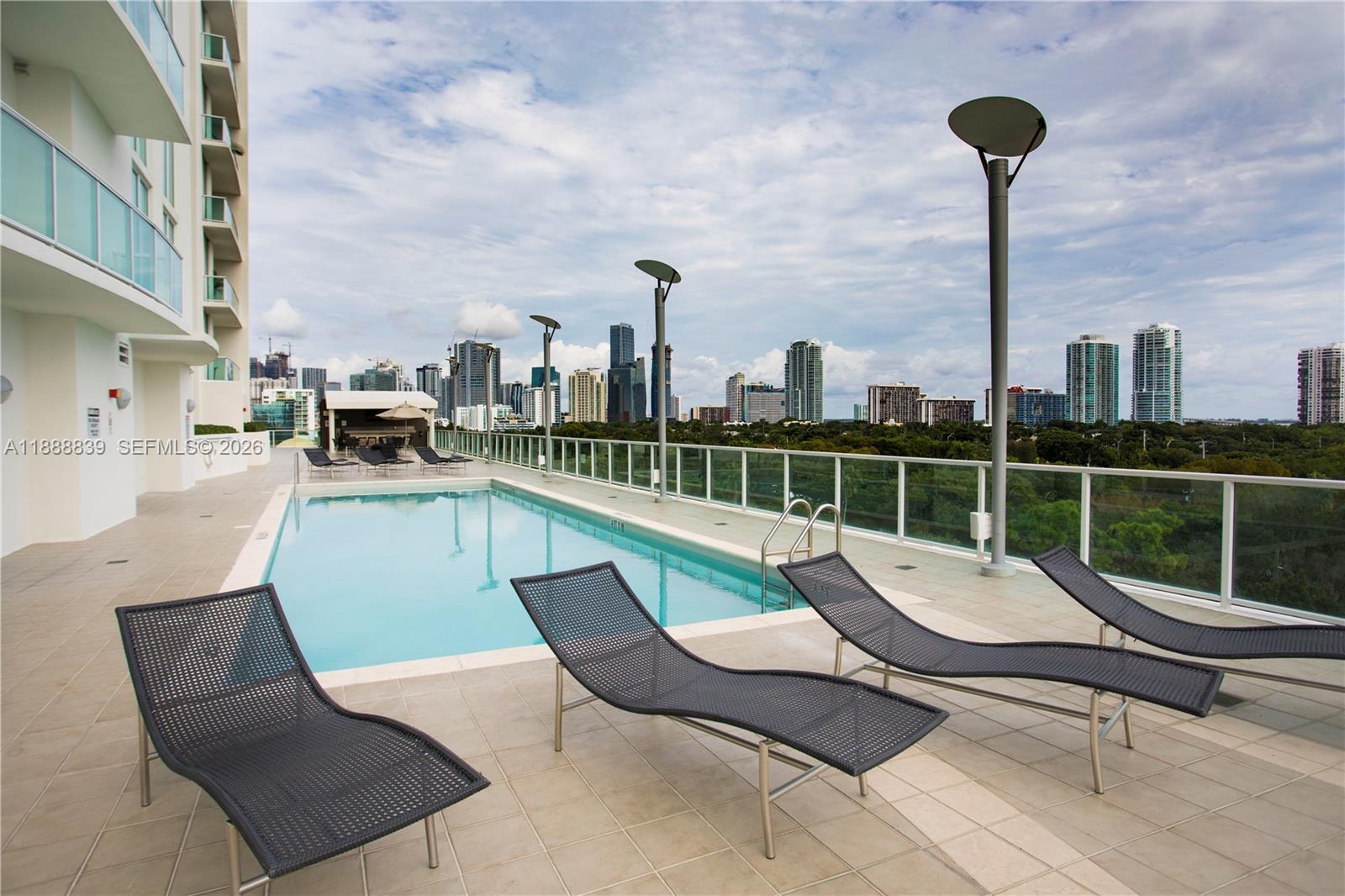 2525 Southwest 3rd Avenue, Unit 1106 Miami, FL 33129 - Photo 18 of 36 a view of a terrace with furniture