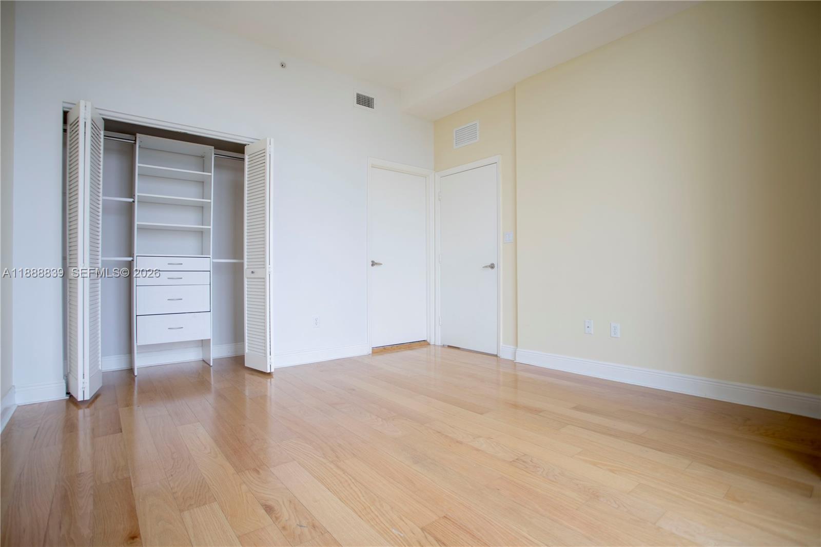 2525 Southwest 3rd Avenue, Unit 1106 Miami, FL 33129 - Photo 8 of 36 a view of empty room with wooden floor