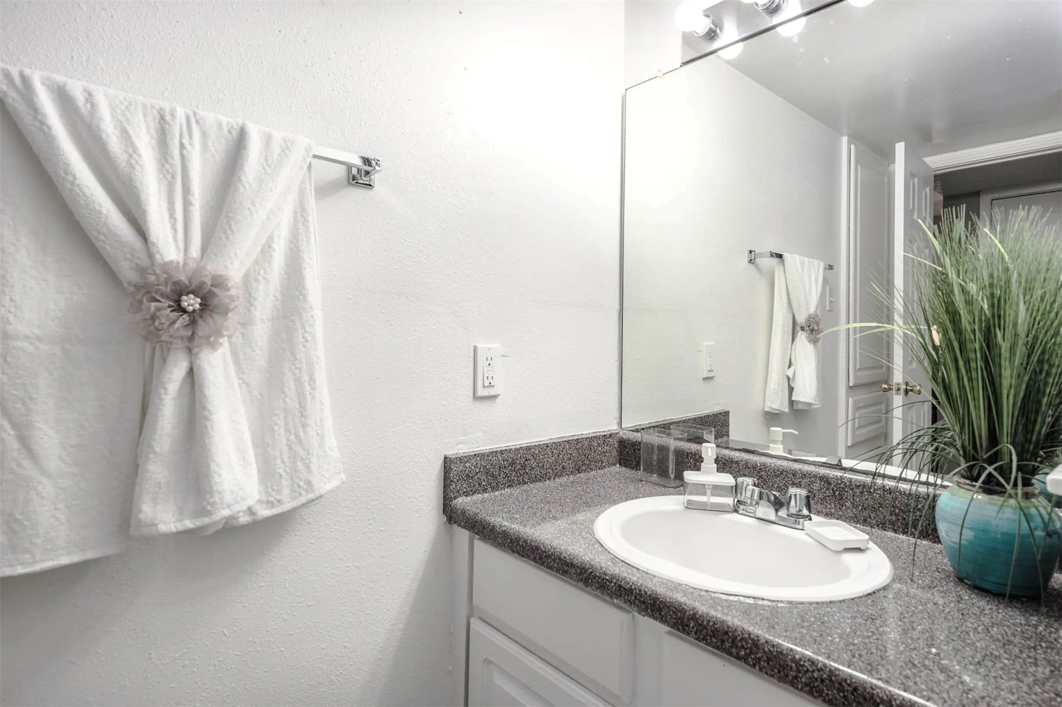 4343 Shaver Street, Unit 1002 Pasadena, TX 77504 - Photo 11 of 14 a bathroom with a sink double vanity and a mirror