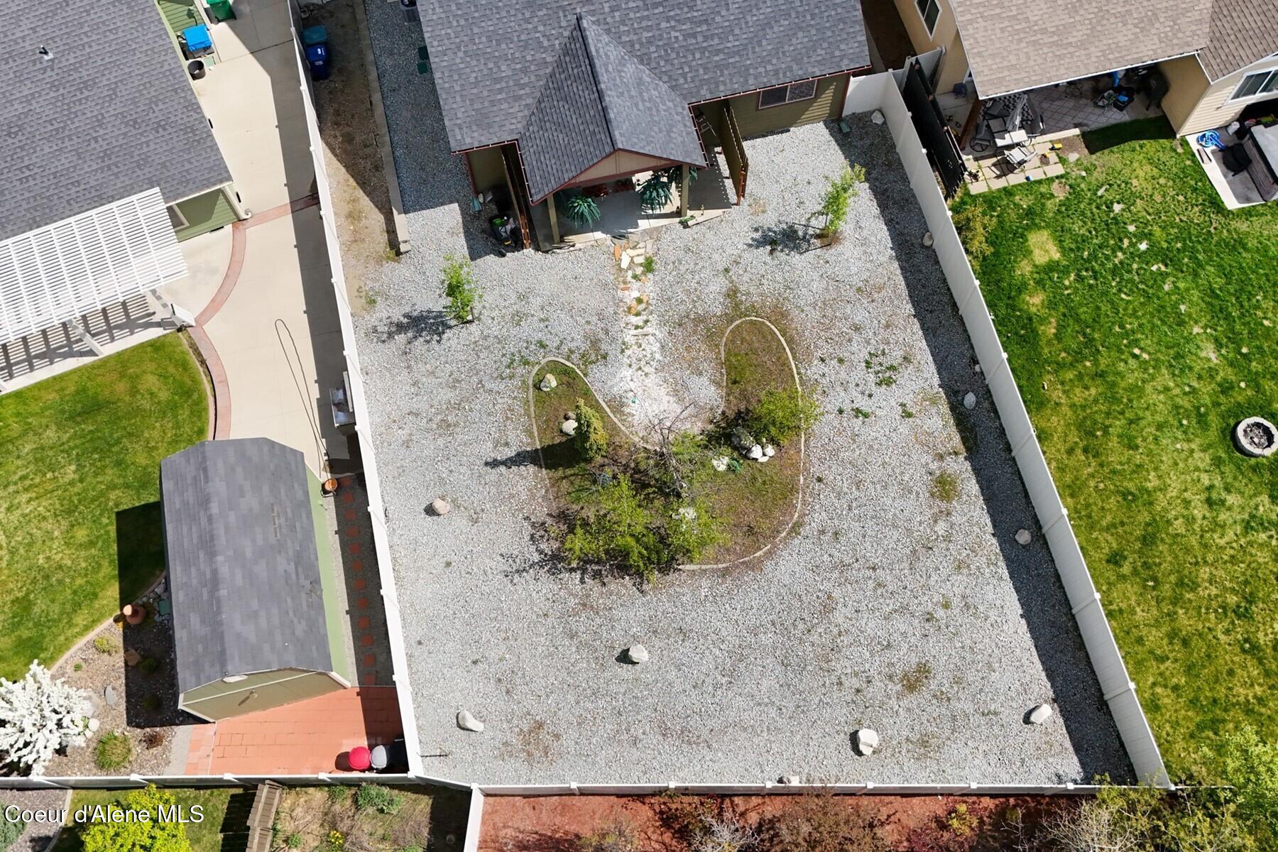 13439 North Shimmering Court Rathdrum, ID 83858 - Photo 46 of 52 Hardscaped backyard